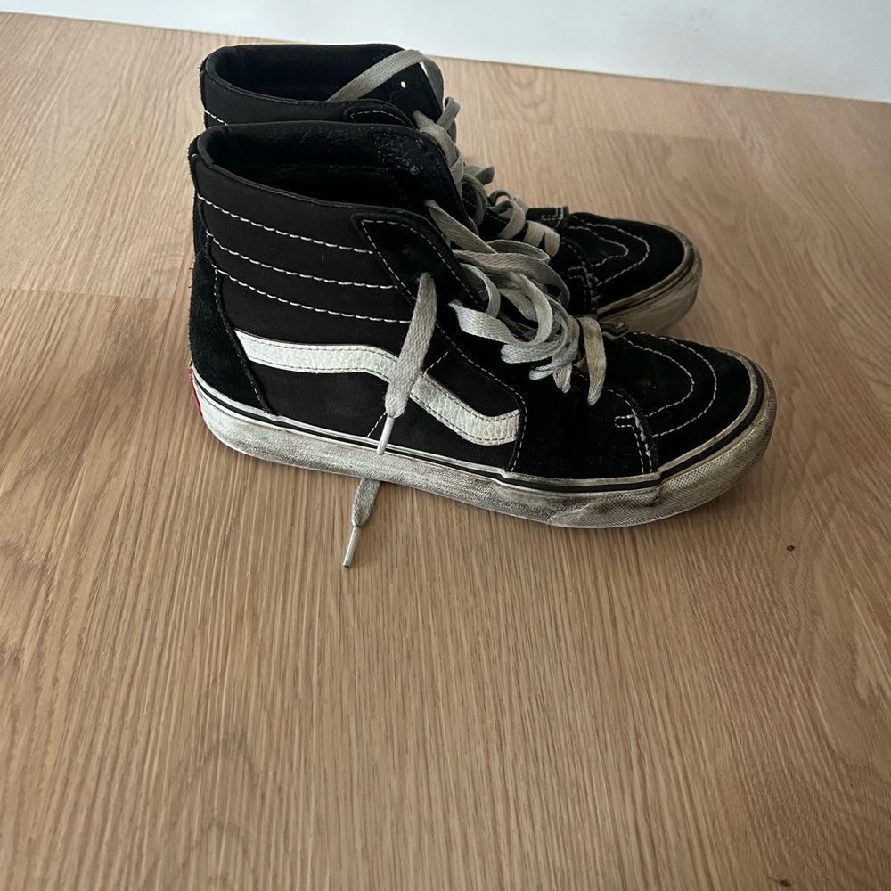 Vans Well-Worn Black and White High-Top Sneakers